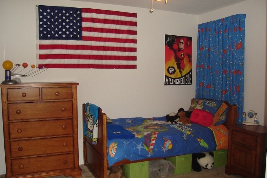 american flag wall hanging in a bedroom