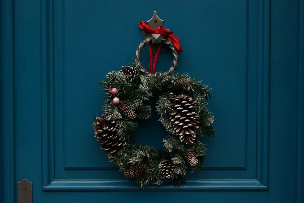 christmas wreath hang on the doorbell