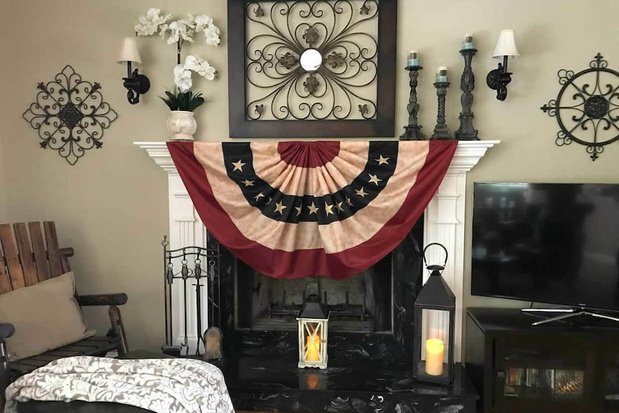 patriotic bunting on a fireplace mantel