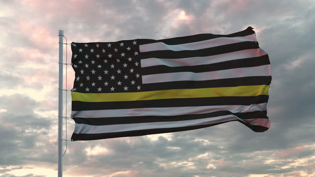 The Black And White American Flag With Yellow Stripe